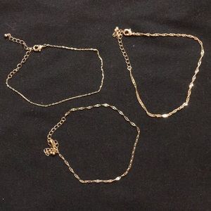 3 gold bracelets